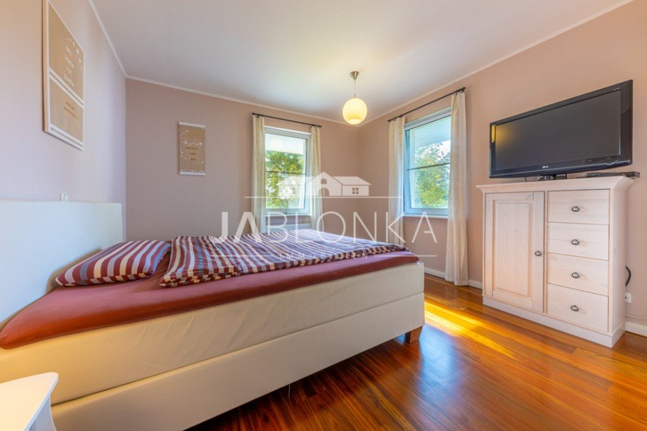 Schlafzimmer mit Ankleide en suite Einfamilienhaus Lehmrade