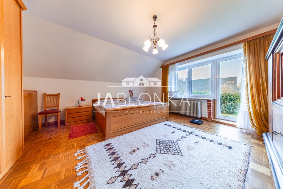 Schlafzimmer mit Balkon Einfamilienhaus Bad Oldesloe / Am Poggensee