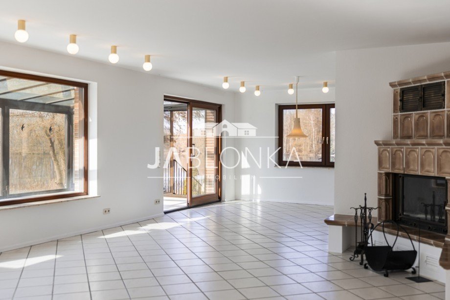 Wohnzimmer mit Kamin Einfamilienhaus Neversdorf