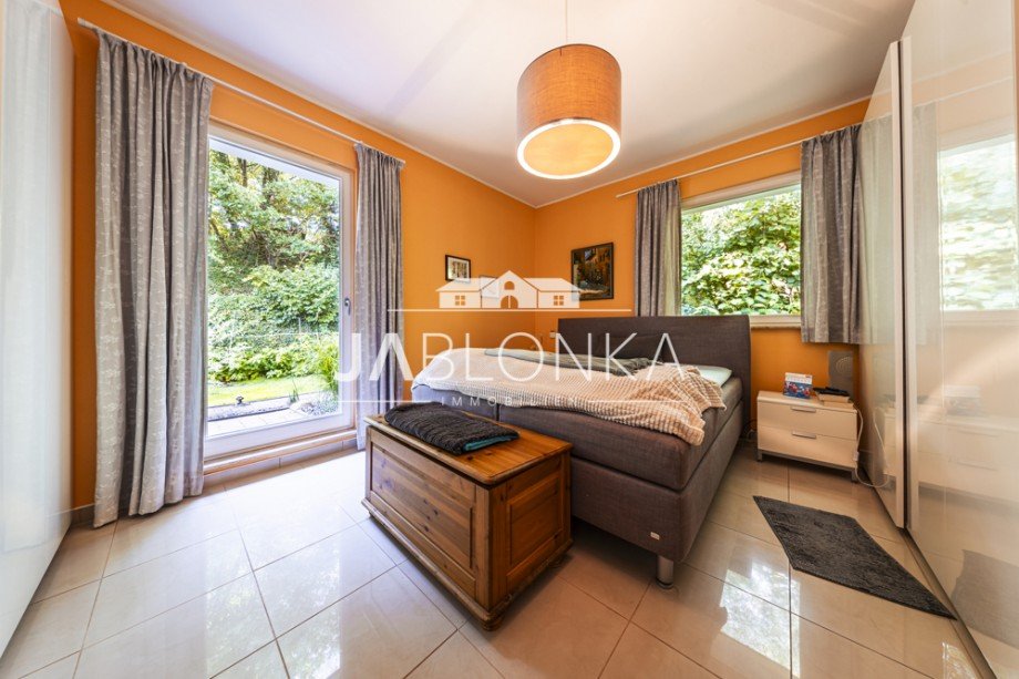 Schlafzimmer mit Zugang zur Terrasse Bungalow G�ster